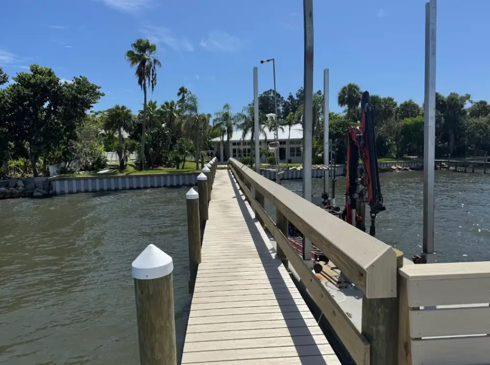 Wooden dock pilings installed by DC Marine Construction in Melbourne, FL