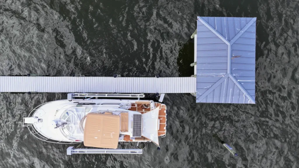 Boat Lift Installation Project Melbourne, FL – (2) Wood piling boat house lift installation in Melbourne, FL